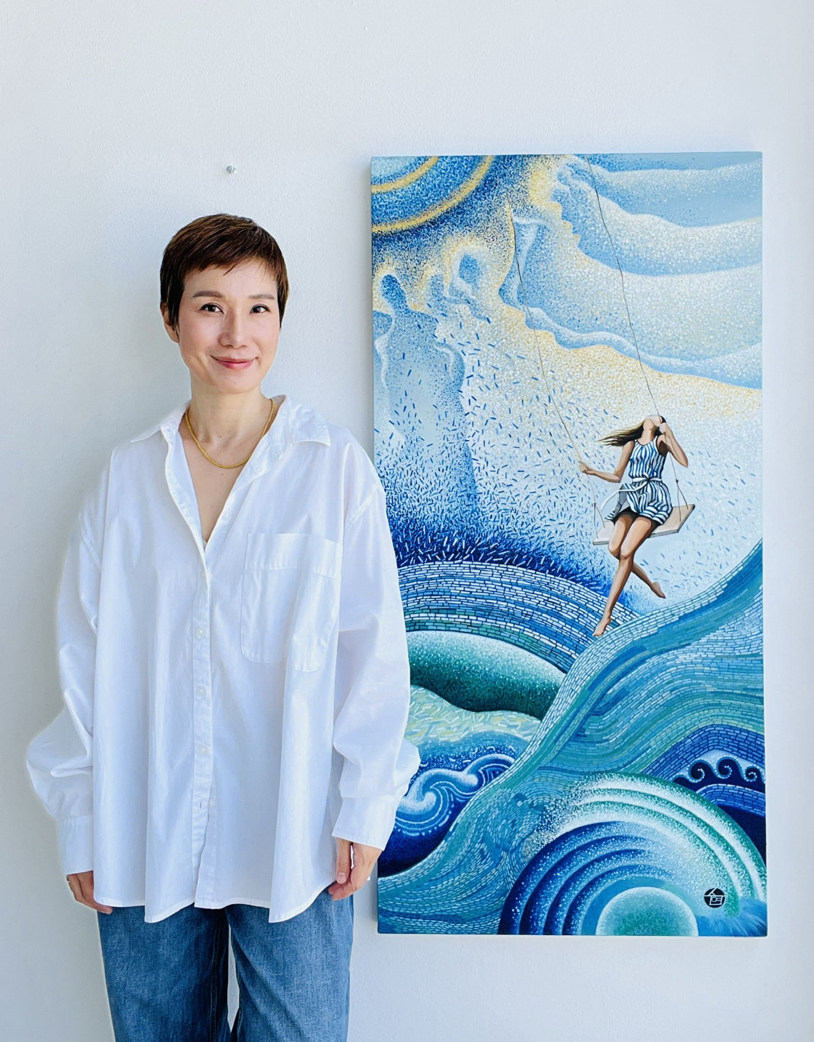 Portrait of Suyeun Lee standing beside one of her acrylic paintings